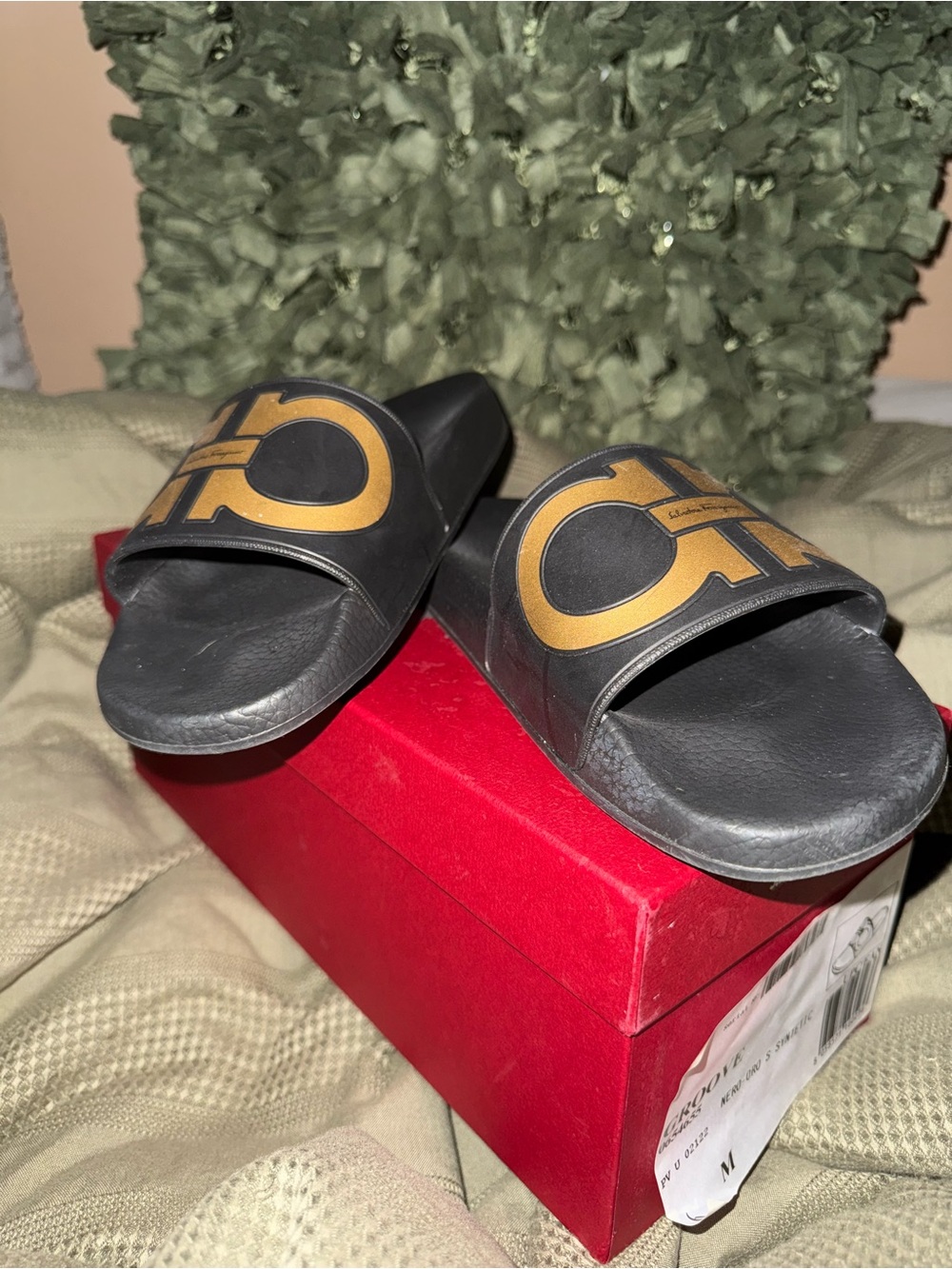 Salvatore Ferragamo Black Slides with Gold Logo